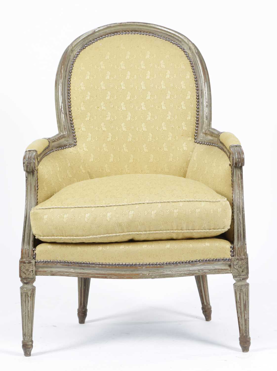 A FRENCH PAINTED BERGÈRE IN LOUIS XVI STYLE, 19TH CENTURY with an arched back and a moulded frame - Image 2 of 2