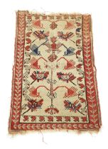 A MELAS RUG WEST ANATOLIA, C.1900 the cream field with a stylised tree of life enclosed by crimson