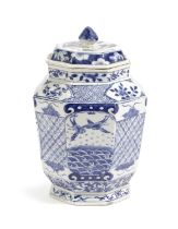 A CHINESE PORCELAIN BLUE AND WHITE OCTAGONAL VASE AND COVER LATE 19TH CENTURY painted with