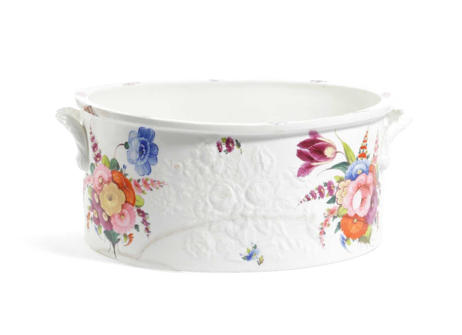 AN ENGLISH PORCELAIN FOOTBATH 19TH CENTURY of oval form, moulded with flowers and painted with