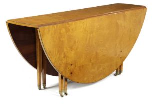 AN HUNGARIAN ASH DINING TABLE IN GEORGE III STYLE, LATE 20TH CENTURY the drop-leaf top above