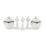 A PAIR OF LIMOGES PORCELAIN POT POURRI VASES MODERN left in the white, applied with flowerheads,