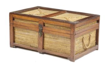 AN ANGLO-INDIAN TEAK AND RATTAN PICNIC HAMPER EARLY 20TH CENTURY the interior with a lift-out basket