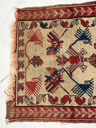 A MELAS RUG WEST ANATOLIA, C.1900 the cream field with a stylised tree of life enclosed by crimson - Image 2 of 4