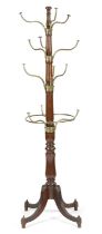 A REGENCY MAHOGANY AND BRASS COAT AND HAT STAND EARLY 19TH CENTURY the baluster turned stem