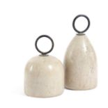 TWO POLISHED LIMESTONE DOORSTOPS EARLY 20TH CENTURY each with a ring handle (2) 21.3cm high (max)