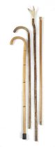 A GEORGE V GOLD CAPPED MALACCA WALKING STICK HALLMARKED '1933' the top engraved with a 'T' beneath a