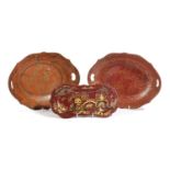 TWO PAPIER-MÂCHÉ TRAYS IN REGENCY STYLE, LATE 19TH / EARLY 20TH CENTURY of shaped oval form with