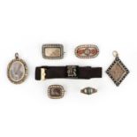 A collection of mourning jewellery, 19th century, comprising: a lozenge-shaped pendant set with a