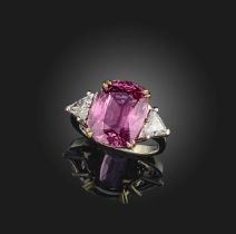 A pink spinel and diamond ring, the cushion-shaped spinel weighing approximately 6.50 carats,