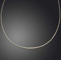 A natural pearl necklace, early 20th century, composed of a single row of graduated natural