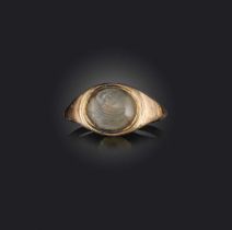 A chalcedony intaglio ring, 19th century, set with a carved chalcedony intaglio depicting a boat