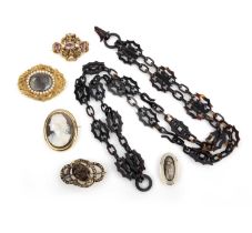 λ A collection of Georgian and Victorian jewels, including a fine Georgian mourning brooch, late