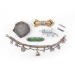 A collection of jewels including an Art Deco charm bracelet, early-mid 20th century, comprising: a
