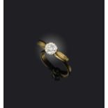 A diamond solitaire ring, claw-set with a brilliant-cut diamond weighing approximately 0.65