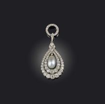 An early 20th century natural pearl and diamond pendant, the pearl drop suspended within borders