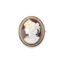 A shell cameo and enamel brooch, late 19th century, set with a finely carved shell cameo depicting a