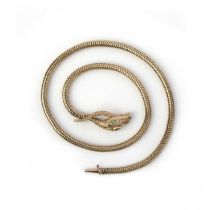 A gold and demantoid garnet necklace, early 20th century, designed as a snake, its eyes set with