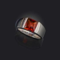 Cartier, a citrine 'Tank' ring, set with a buff-top orange citrine in plain white gold shank, marked