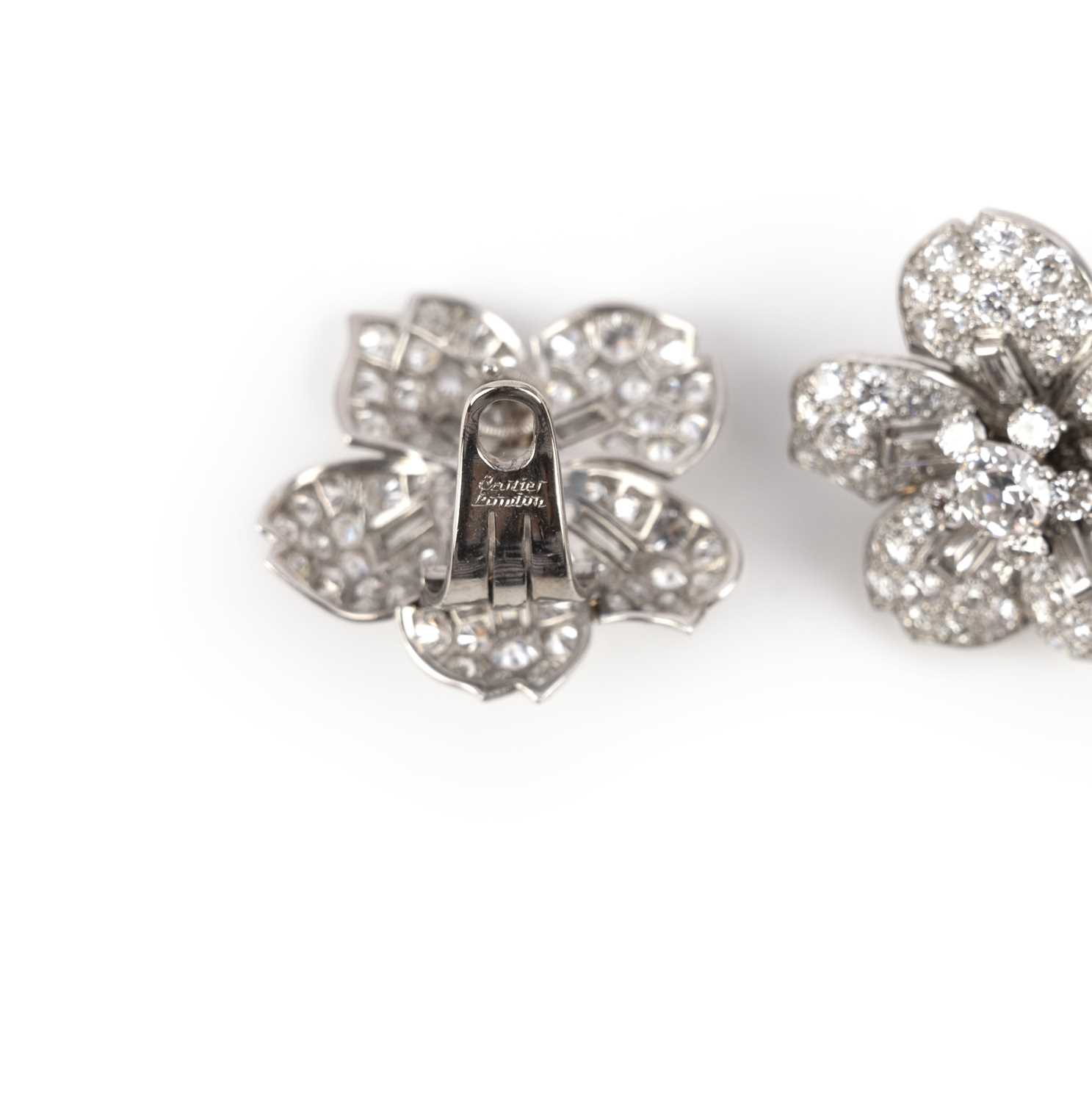 Cartier, a pair of diamond earrings, 1950s, each designed as a five-petalled flower, set with - Image 5 of 5