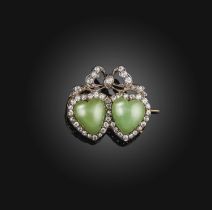 A Victorian chrysoprase and diamond brooch, late 19th century, designed as two hearts surmounted
