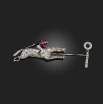 An early 20th century horse and jockey jabot pin, designed as a horse and jockey racing towards