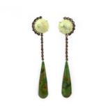 A pair of hardstone and diamond ear clips, each of pendent design, designed as a cabochon of green