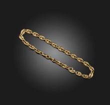 Cartier, a gold bracelet, designed as an anchor-link chain in 18ct gold, length 18.5cm, signed
