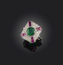 An emerald, ruby and diamond ring, designed as a plaque set with a circular-cut emerald, within a