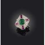 An emerald, ruby and diamond ring, designed as a plaque set with a circular-cut emerald, within a