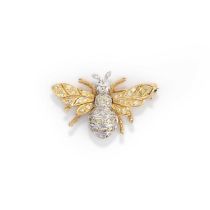 A yellow diamond brooch, designed as a bee in flight, set with brilliant-cut diamonds of yellow