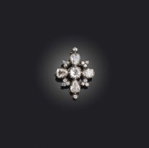 A George III diamond brooch, of quatrefoil design set with graduated cushion-shaped and pear-