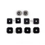 A cased dress set of cufflinks and six studs, each composed of polished onyx centring on a