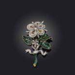 A topaz and diamond brooch, mid 19th century, designed as a flower, the head mounted 'en