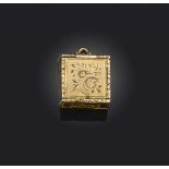 A Regency gold locket pendant, in the form of a cube, each square panel is hinged and opens to be