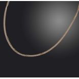 Cartier, a gold 'Trinity' necklace, formed of three fine link gold chains in yellow, white and