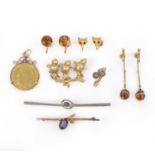 A collection of jewels including a George III guinea coin pendant, comprising: a 9ct gold brooch