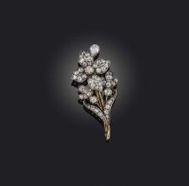 A diamond brooch, late 19th century, of floral design, set with circular-cut and pear-shaped