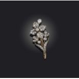 A diamond brooch, late 19th century, of floral design, set with circular-cut and pear-shaped