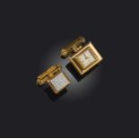 UTI a pair of gold watch cufflinks, one set with a rectangular watch, manual winding in