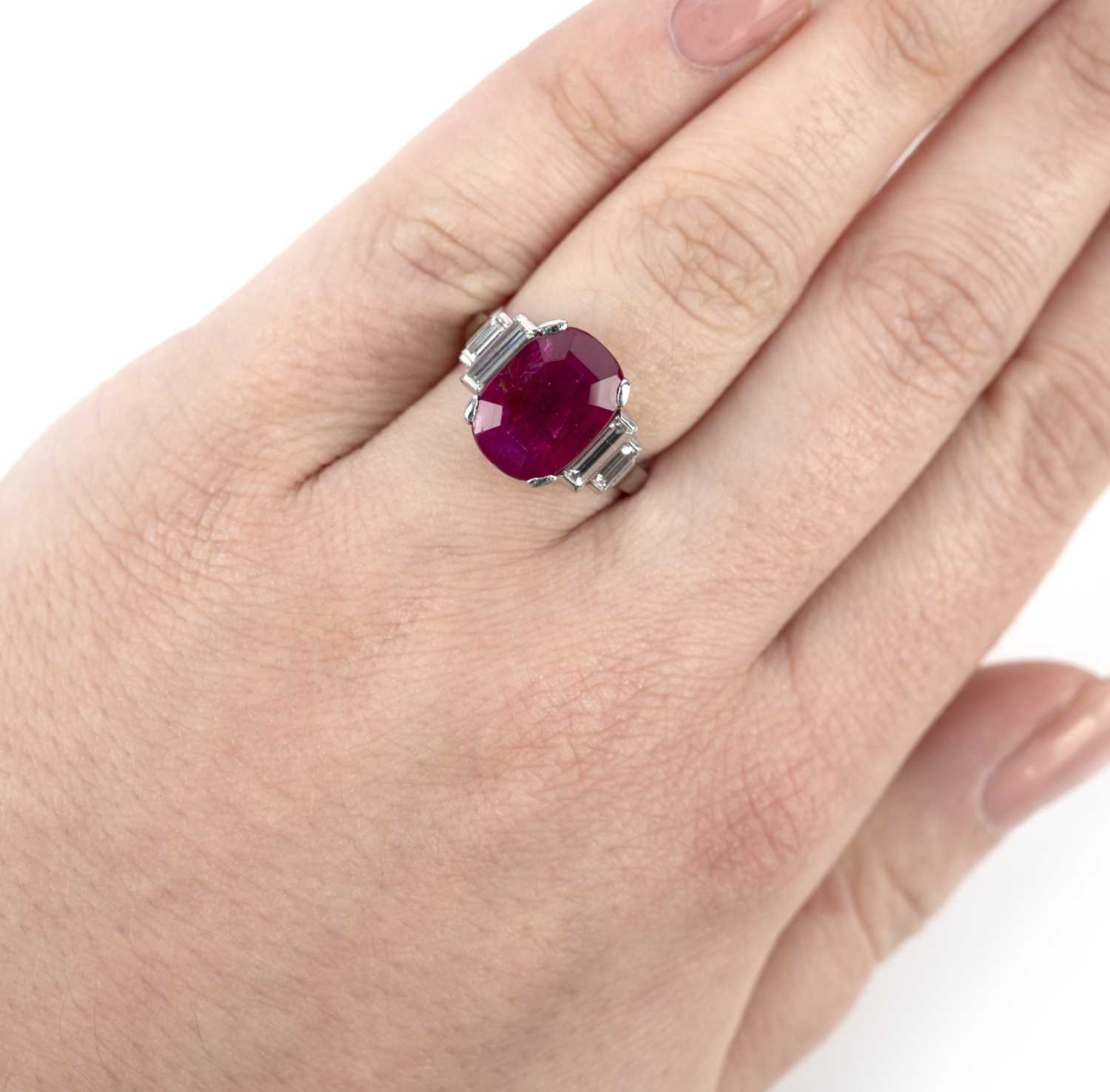 An impressive Art Deco ruby and diamond ring, 1920s, set with a cushion-shaped ruby weighing 5. - Image 3 of 7