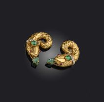 A pair of gold, emerald, ruby and diamond ear clips, each designed as a snake, set with carved and
