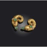 A pair of gold, emerald, ruby and diamond ear clips, each designed as a snake, set with carved and