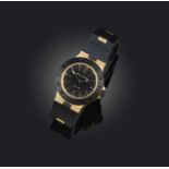 Bulgari, a gentleman's gold 'Diagono' wristwatch, ref. AL38G, black dial with gold baton and