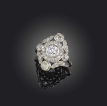 An attractive Belle Epoque diamond ring, circa 1915, designed as a foliate cluster, centring on a