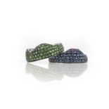 Two gem-set rings, each of undulating outline, pavé-set with circular-cut green garnets and blue