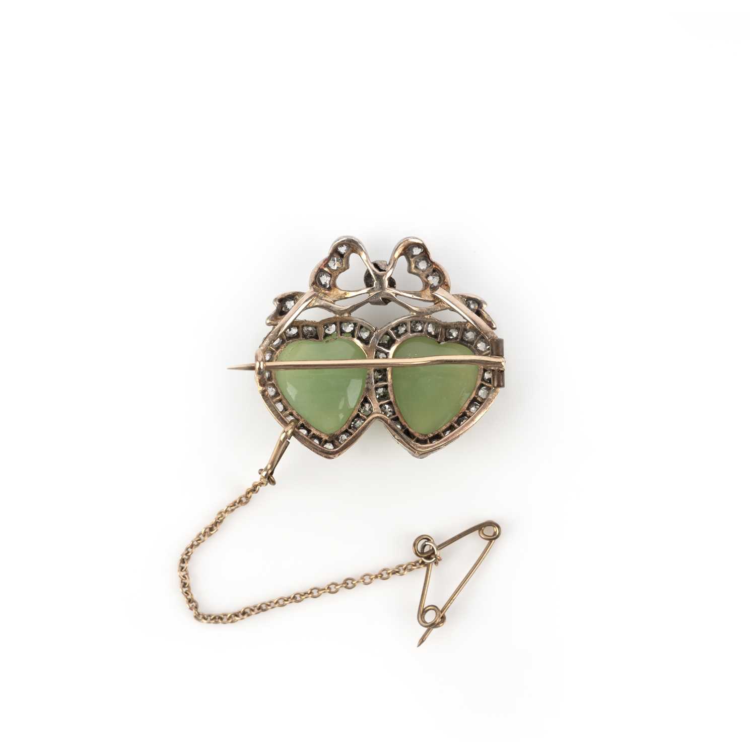 A Victorian chrysoprase and diamond brooch, late 19th century, designed as two hearts surmounted - Image 2 of 2