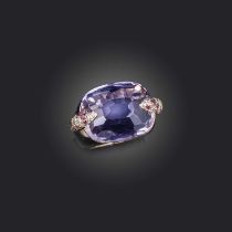 Pomellato, an amethyst, garnet and diamond ring, set with a cushion-shaped amethyst, between