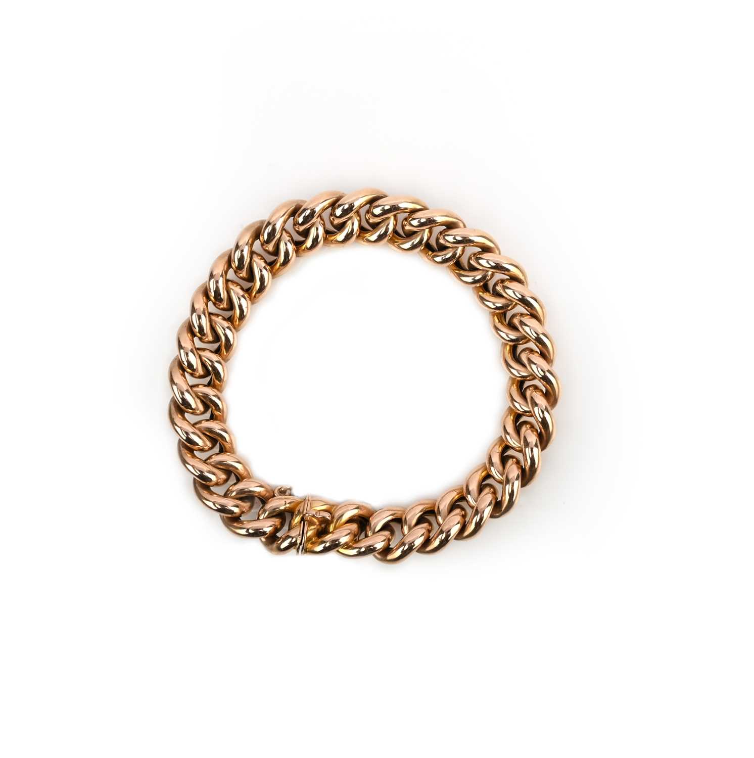 A gold bracelet, late 19th/early 20th century, of curb linking, length 19.5cm, stamped 15, gross