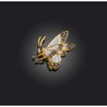 A sapphire and diamond brooch, designed as a bee in profile, set with sapphires and diamonds,